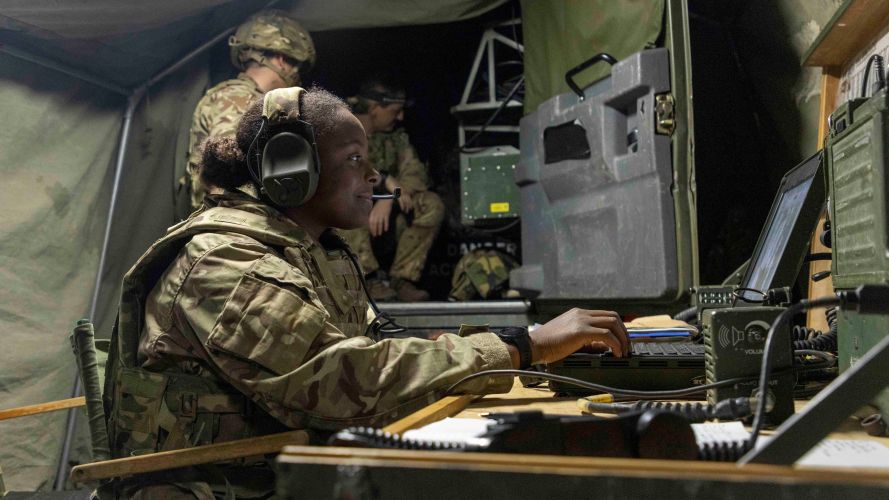 A signaller monitors comms at Excon during Apache AH-64E's first outing into the field 26102022 CREDIT MOD Crown Copyright.jpg