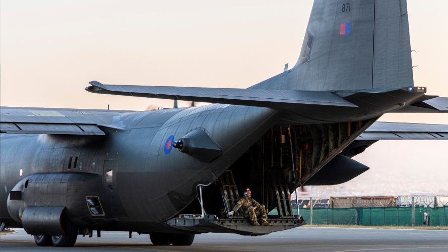 Aircrew sits on the tailgate of the C-130 bound for Sudan 25042023 CREDIT MOD Crown Copyright.jpg