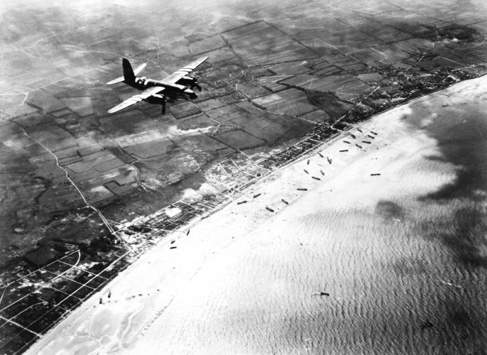 American B-26 Marauder returns to UK base, flying across the invasion on Sword beach