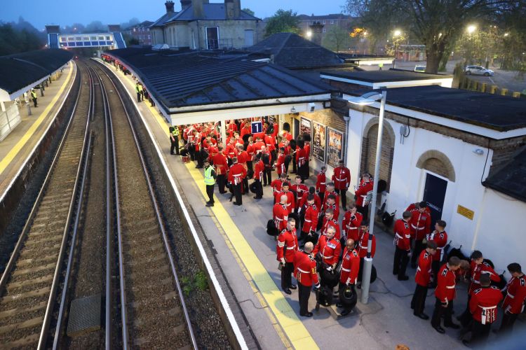Army contingent wait for their train to London Waterloo to the Coronation of King Charles III 060523 CREDIT MOD