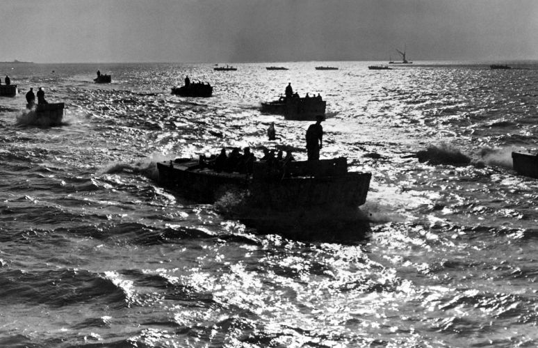 Assault landing crafts carrying Royal Marines form up in the Channel on the night of 5 June 1944, ahead of taking part in the D-Day assault the next morning 