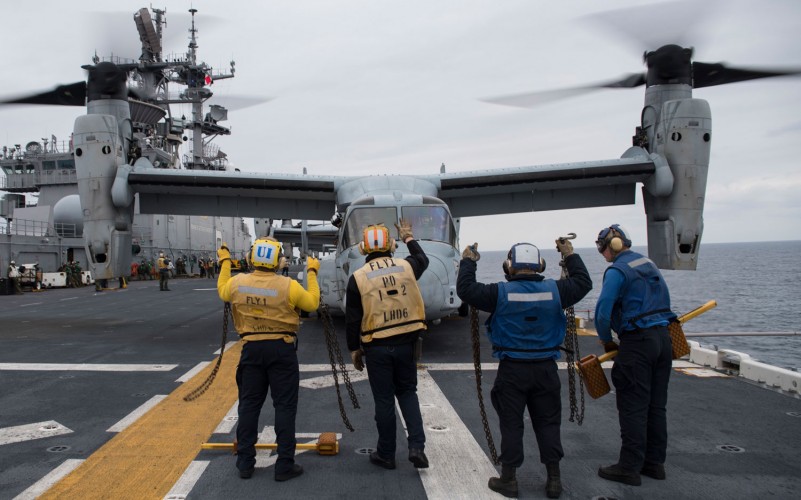 Air Dept Sailors Signal For Take-Off 
