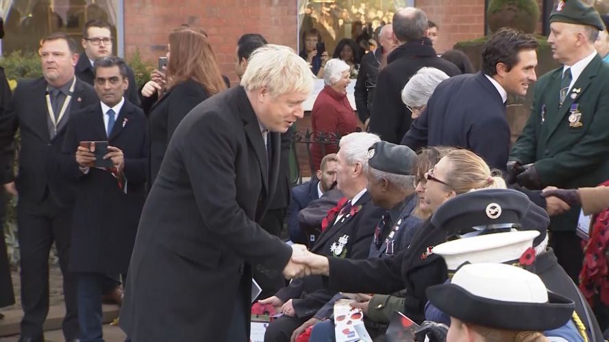 Boris Johnson shakes hands with veterans on Armistice Day in Wolverhampton.