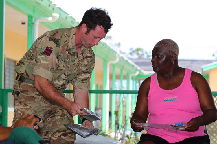 British soldier part of a team from RFA Mounts Bay, providing aid assistance to the Islanders of Great Abaco 040919 CREDIT MOD