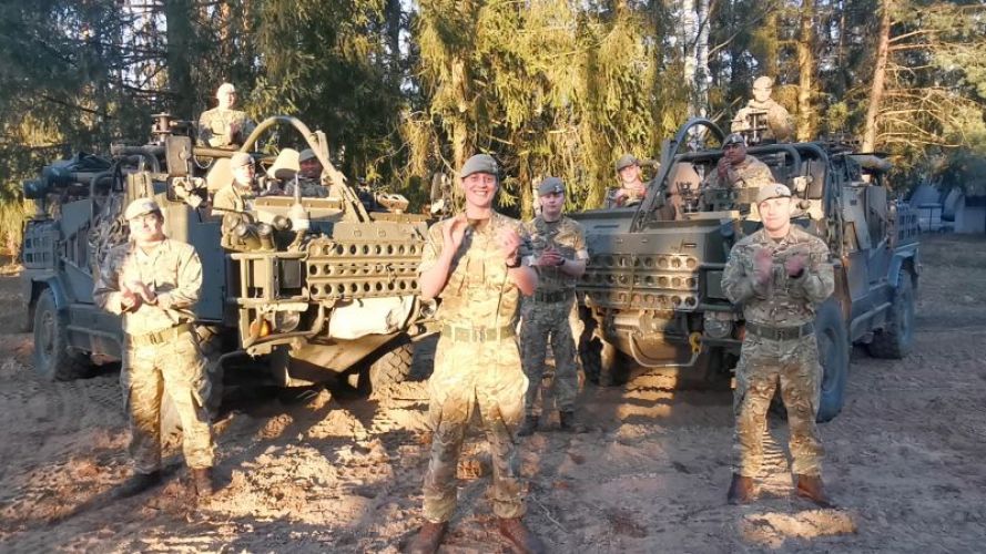British troops in Poland clap NHS staff battling coronavirus pandemic (Picture: MOD).