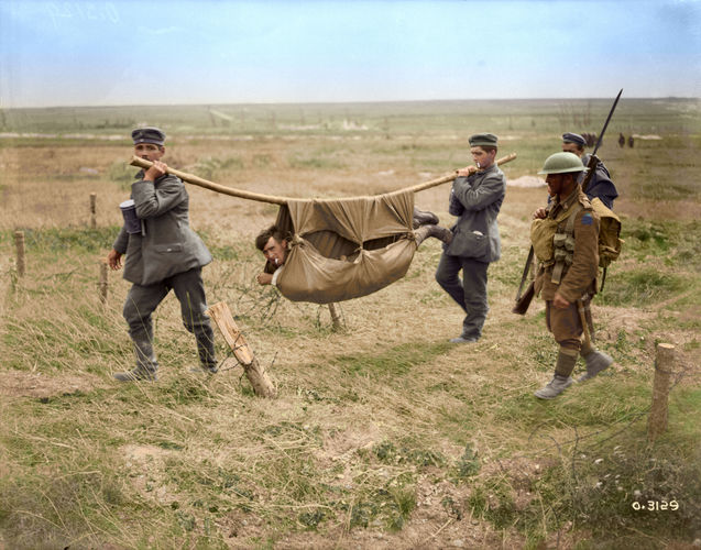 German prisoners carrying Canadian wounded (Picture: Vimy Foundation).
