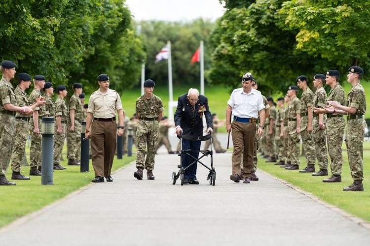 The veteran was applauded as he visited the North Yorkshire training establishment (Picture: MOD).