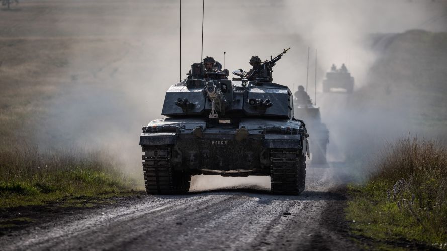 Challenger 2 tanks roll across Salisbury Plain. Exercise IRON CYCLONE 25072023 CREDIT MOD.jpg