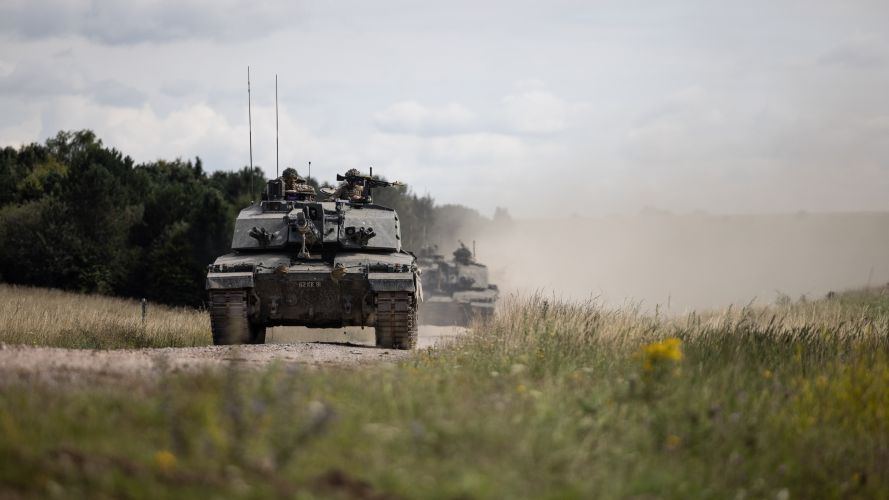 Challenger 2 tanks roll across Salisbury Plain. IRON CYCLONE 25072023 CREDIT MOD.jpg