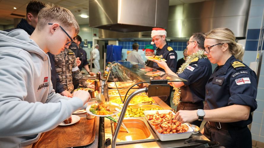 Personnel stationed at HMNB Clyde are taking full advantage of a Christmas tradition, whereby officers serve festive dinner to the junior ranks