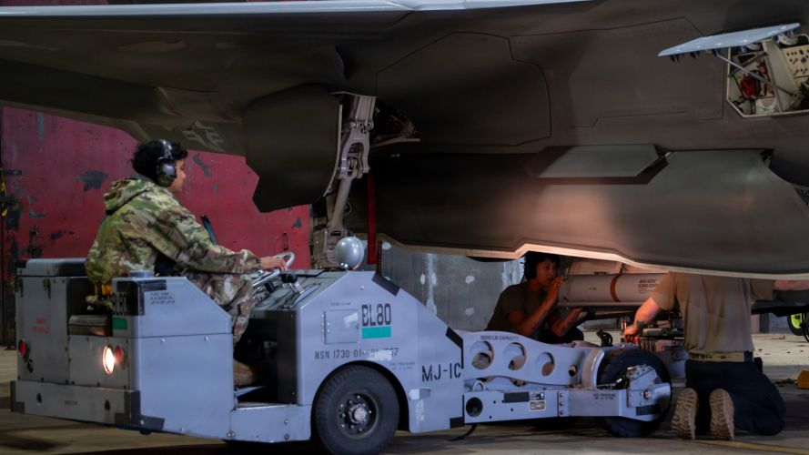 Combat Archer AIM-120 Advanced Medium-Range Air to Air Missile onto an F-35A Lightning II RAF Lakenheath CREDIT DVIDS