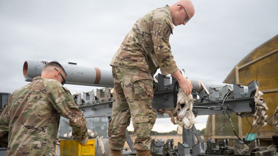 Combat Archer precision guided munitions inspector prepares AIM-120 Advanced Medium-Range Air-to-Air Missile RAF Lakenheath CREDIT DVIDS