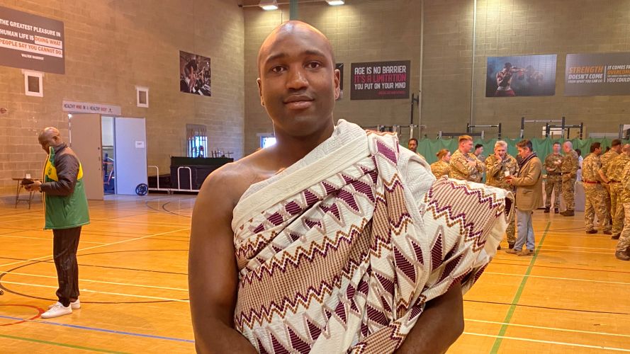 Commonwealh Day Celebration at Baker Barracks, Thorney Island -Sgt Cobbinah of 16 Regime Royal Artillery in traditional Ghanaian 'Kente' dress 14032022 CREDIT BFBS