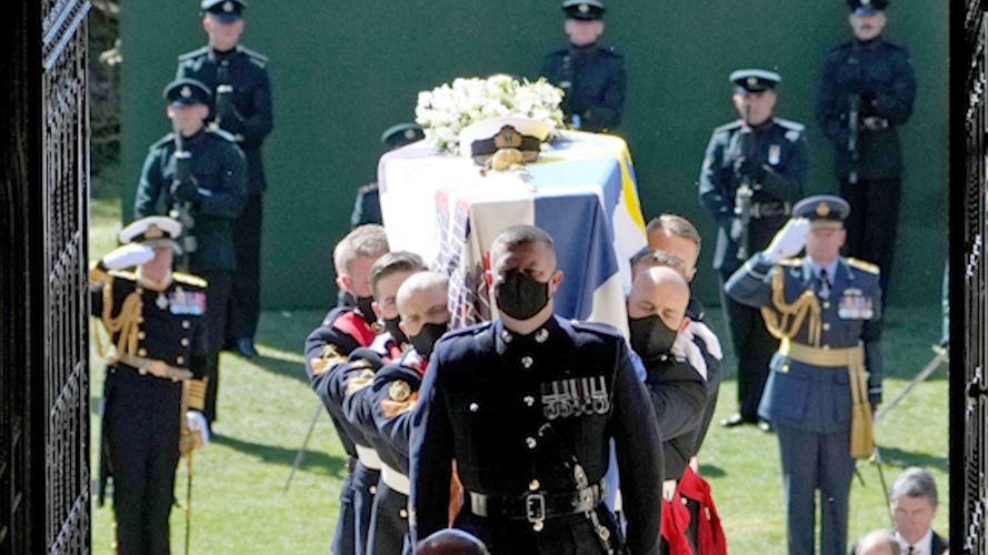 The Duke of Edinburgh's coffin is carried in to the funeral service (Picture: PA/ Alamy). The Duke of Edinburgh's coffin is carried into the funeral service (Picture: PA/ Alamy)
