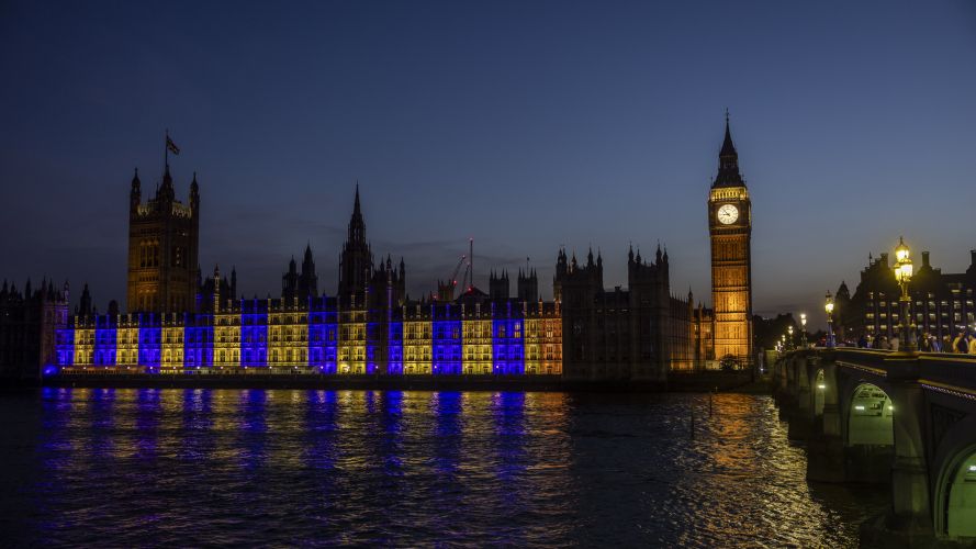 The view across the Thames as the Houses of Parliament are lit up in support of Ukraine (Picture: MOD) Ukrainian colours light up the river frontage of the Palace of Westminster (Picture: MOD)