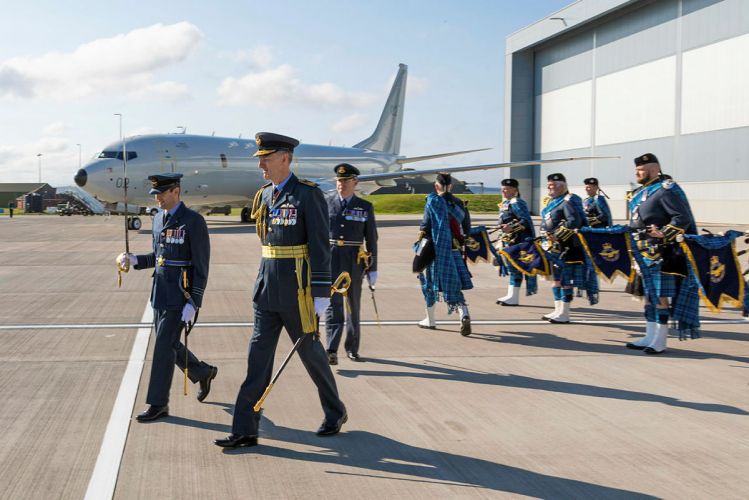 Deputy Commander Operations, Air Marshal Gerry Mayhew inspects the Pipes and Drums Band accompanied by the Station Commander of RAF Lossiemouth 01092021 CREDIT MOD