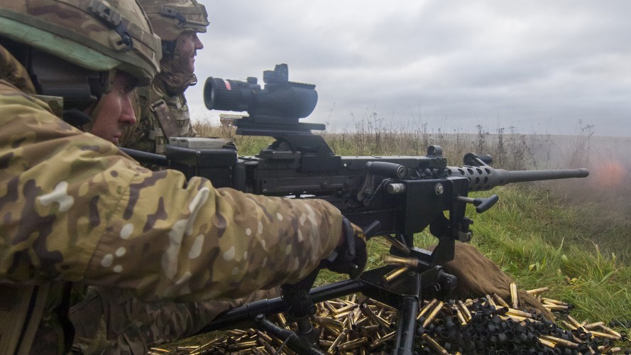 Exercise Racing Snake firing heavy machine gun 
