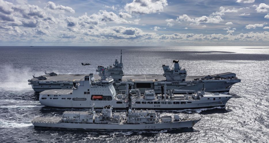 F-35B Lightning jet lands on HMS Queen Elizabeth as she sails closely with tanker RFA Tideforce and Type 23 frigate HMS Northumberland Kyle Heller 02102020 CREDIT ROYAL NAVY