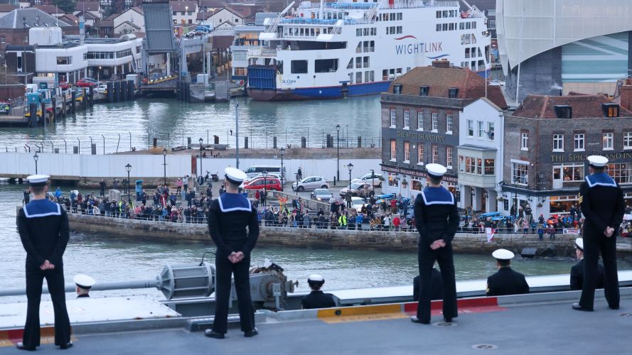 Friends and family welcome HMS Queen Elizabeth back into Portsmouth after landmark seven-month mission CSG21 (Picture: MOD). Friends and family welcome HMS Queen Elizabeth in Portsmouth after landmark seven-month mission CSG21 09112021 CREDIT MOD.jpg