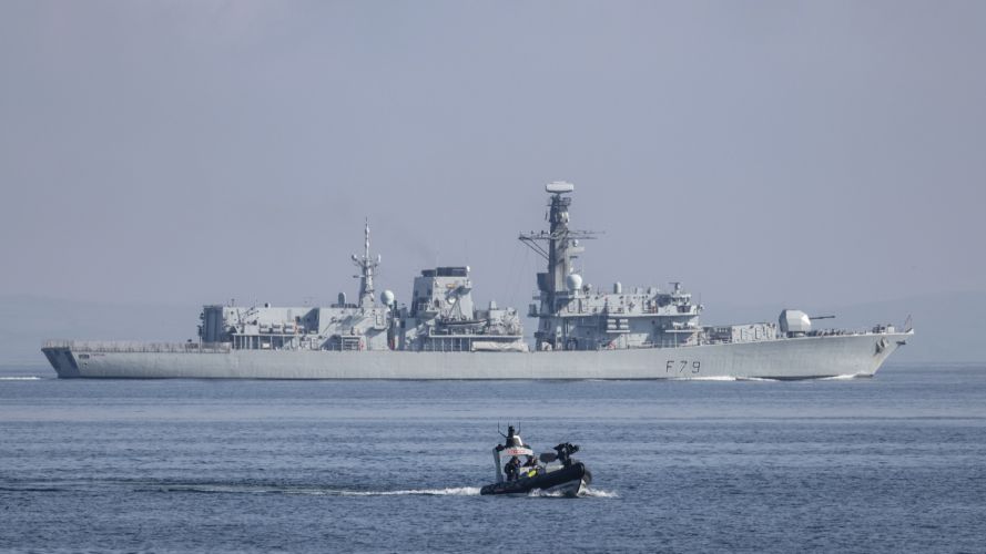 HMS Argyll in the background with a Pacific24 at sea