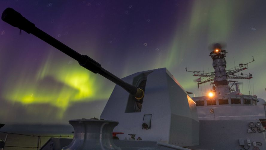 Navy warship HMS Lancaster at the centre of a spectacular Northern Lights show during a patrol in the Arctic (Picture: Royal Navy). HMS Lancaster surrounded by Northern Lights in the Arctic 270921 CREDIT ROYAL NAVY.jpg