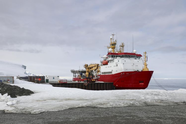 HMS Protector berthed at British Antarctic Survey research station, Rothera