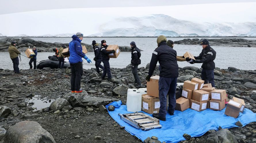 HMS Protector restocking Antarctic trust at Port Lockroy not disturbing nesting Gentoo penguins 25012022 CREDIT HMS Protector Twitter.jpeg