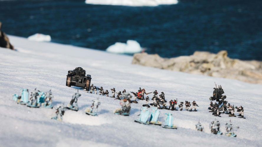 HMS Protector sailors play with Warhammer pieces in the snow11022023 CREDIT Royal Navy.jpg