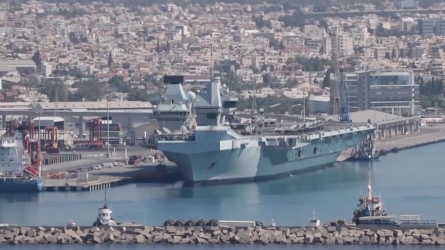 Royal Navy flagship HMS Queen Elizabeth led CSG21 into Cyprus in June (Picture: Cpl Phil Dye/RAF). HMS Queen Elizabeth in Cyprus after Op Shader role unknown date CREDIT Cpl Phil Dye RAF Akrotiri .jpg