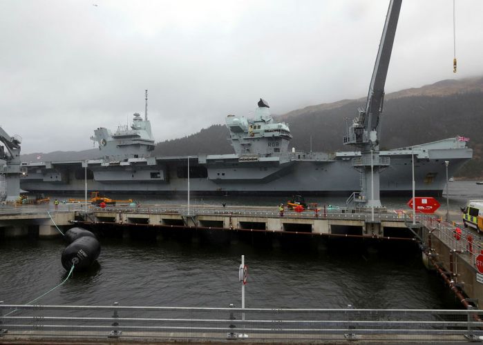 HMS Queen Elizabeth in the Firth of Clyde, Scotland, berthed at the Glen Mallan ammunition jetty