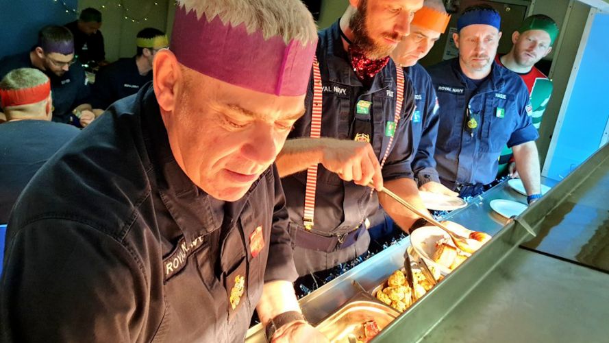 HMS Richmond crew enjoying food on route home for Christmas 05122021 CREDIT HMS Richmond Twitter.jpg