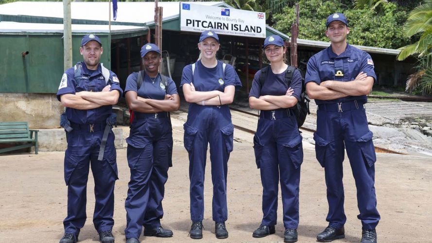 HMS Spey sailors pose for a photo on Pitcairn Island 