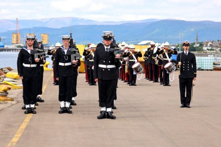 HMS Spey's crew about to start marching during the commissioning service for the ship