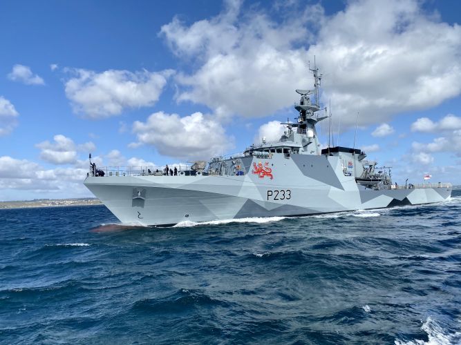 HMS Tamar, in April, with her iconic wartime 'dazzle camouflage' paint job. HMS Tamar leaves Falmouth with dazzle camouflage makeover 040521 CREDIT BFBS.jpg