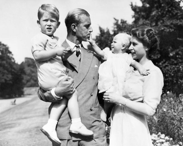 A young Prince Charles and Princess Anne with their parents in the garden at Clarence House (Picture: © Keystone Press Agency/Keystone USA via ZUMAPRESS.com/Alamy). A young Prince Charles and Princess Anne with their parents in the garden at Clarence House (Picture: © Keystone Press Agency/Keystone USA via ZUMAPRESS.com/Alamy).