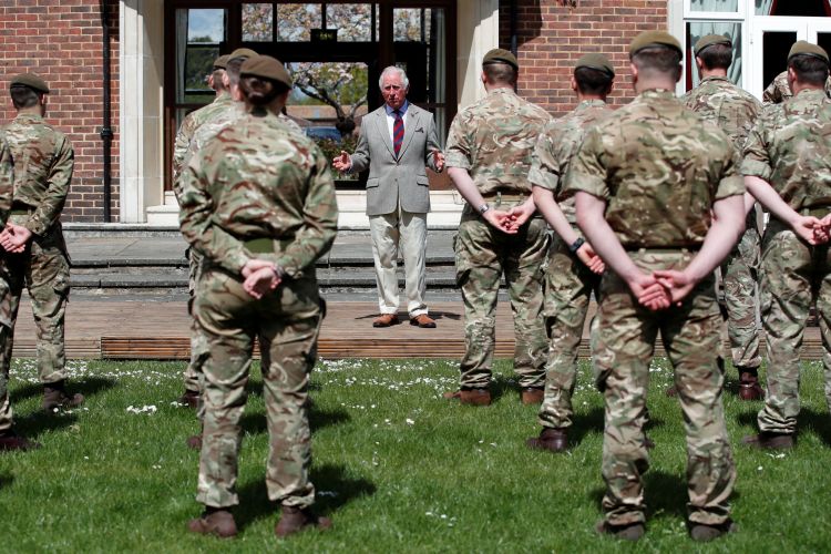 Prince Charles addresses members of the Welsh Guards at Combermere Barracks in Windsor in May 2021 (Picture: Reuters, Peter Cziborra, Pool, Alamy Stock Photo).