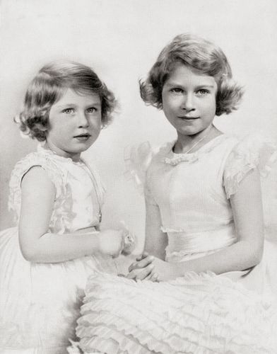 Princess Margaret (left) and Princess Elizabeth in 1937 (Picture: Classic Image/Alamy Stock Photo). Princess Margaret (left) and Princess Elizabeth in 1937 (Picture: Classic Image/Alamy Stock Photo).