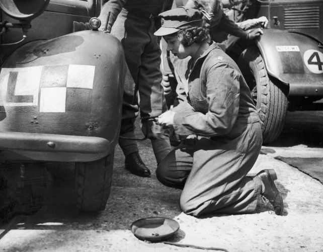 The future Queen Elizabeth II learning car maintenance skills during the war (Picture: Trinity Mirror/Mirrorpix/Alamy Stock Photo). The future Queen Elizabeth II learning car maintenance skills during the war (Picture: Trinity Mirror/Mirrorpix/Alamy Stock Photo).