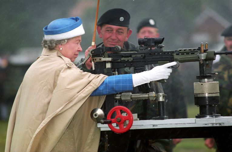  Queen Elizabeth II fires SA 80 rifle during centenary of Army Rifle Association at Bisley