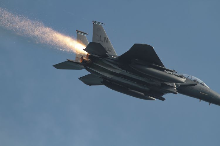 Sparks fly from an F-15 jet taking off from RAF Lakenheath (Picture: Ian Simpson).
