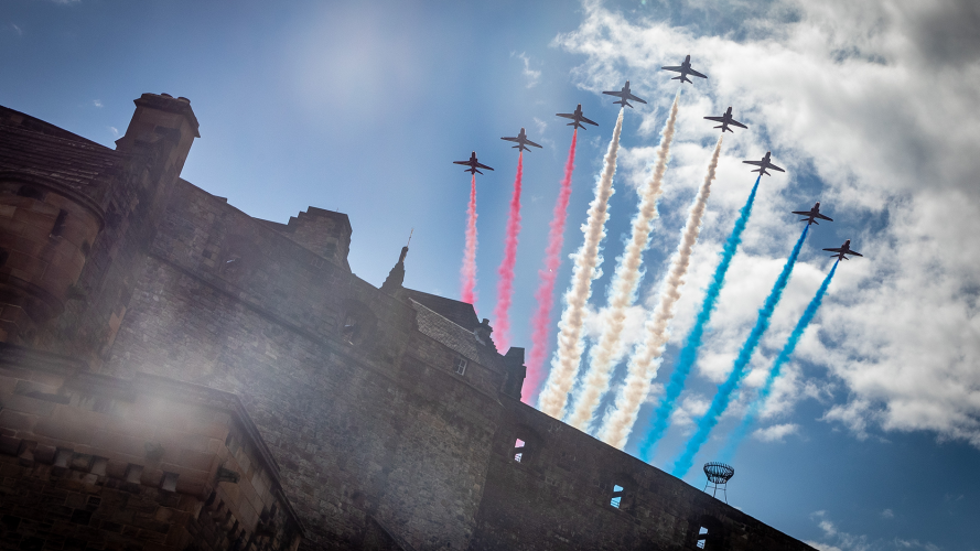 Image of the Red Arrows flypast over Edinburgh Castle in Scotland