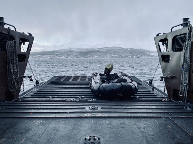 Inflatable Raiding Craft on the back of a landing craft on NATO's Exercise Cold Response 