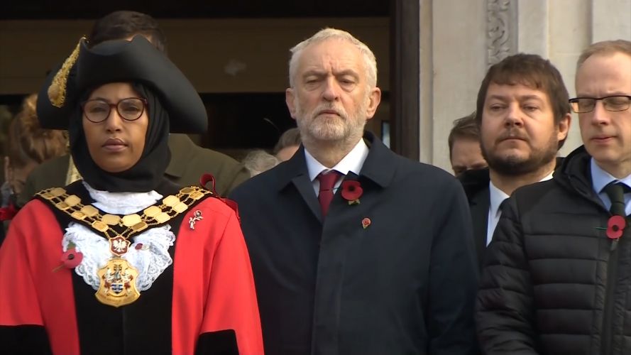 Jeremy Corbyn observes commemorations on Armistice Day in London.
