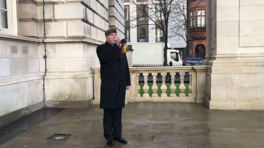 The Last Post sounds during Armistice Day commemorations in Belfast.