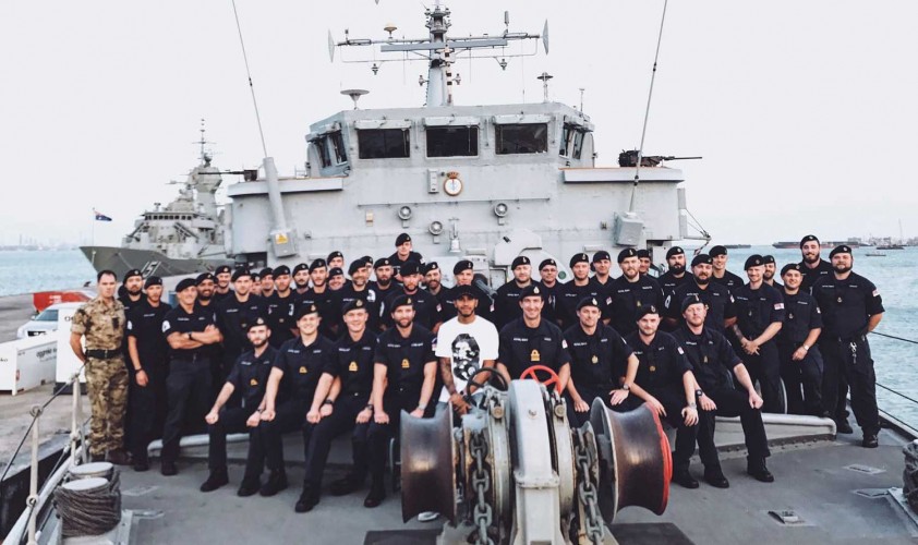 The British Formula 1 racing car driver visited sailors in Bahrain