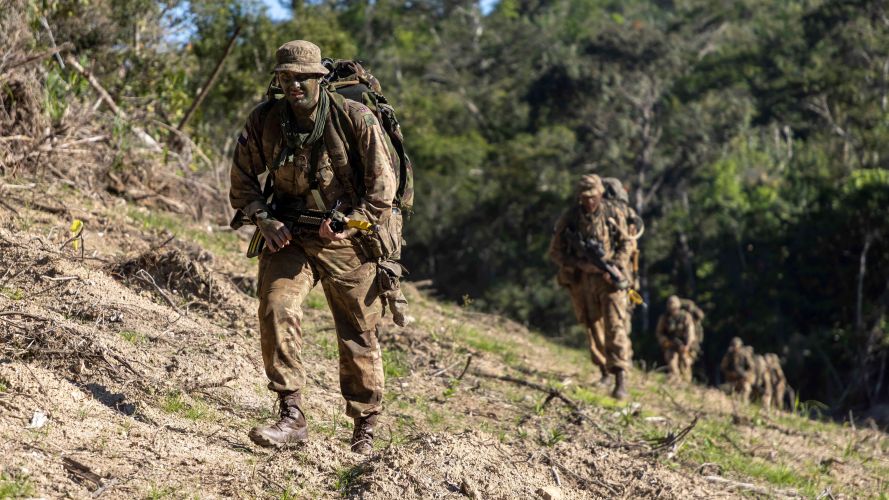 Members of 216 Parachute Signal Squadron patrol off into the jungle 25012023 CREDIT MOD Crown Copyright.jpg