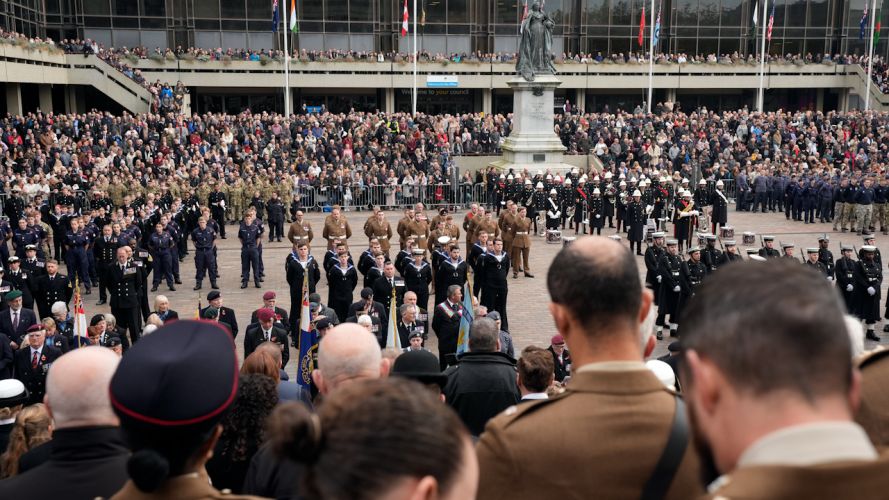 Members of the Armed forces and public gather in Guildhall Square in Portsmouth (Picture: PA)