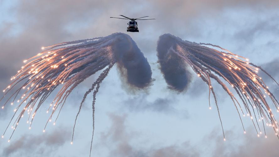 Merlin helicopter from 820 Naval Air Squadron loaded and fired flares from HMS Prince of Wales 27022024 CREDIT MOD