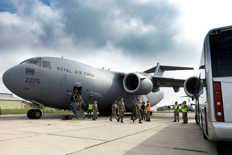 Military personnel arriving at RAF Brize Norton, seen departing from a RAF C-17 aircraft, after leaving Afghanistan where troops were deployed to help the UK's evacuation from Kabul airport