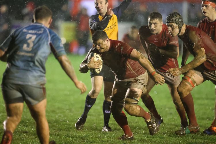 The Army battled wet and muddy conditions to give themselves the early advantage